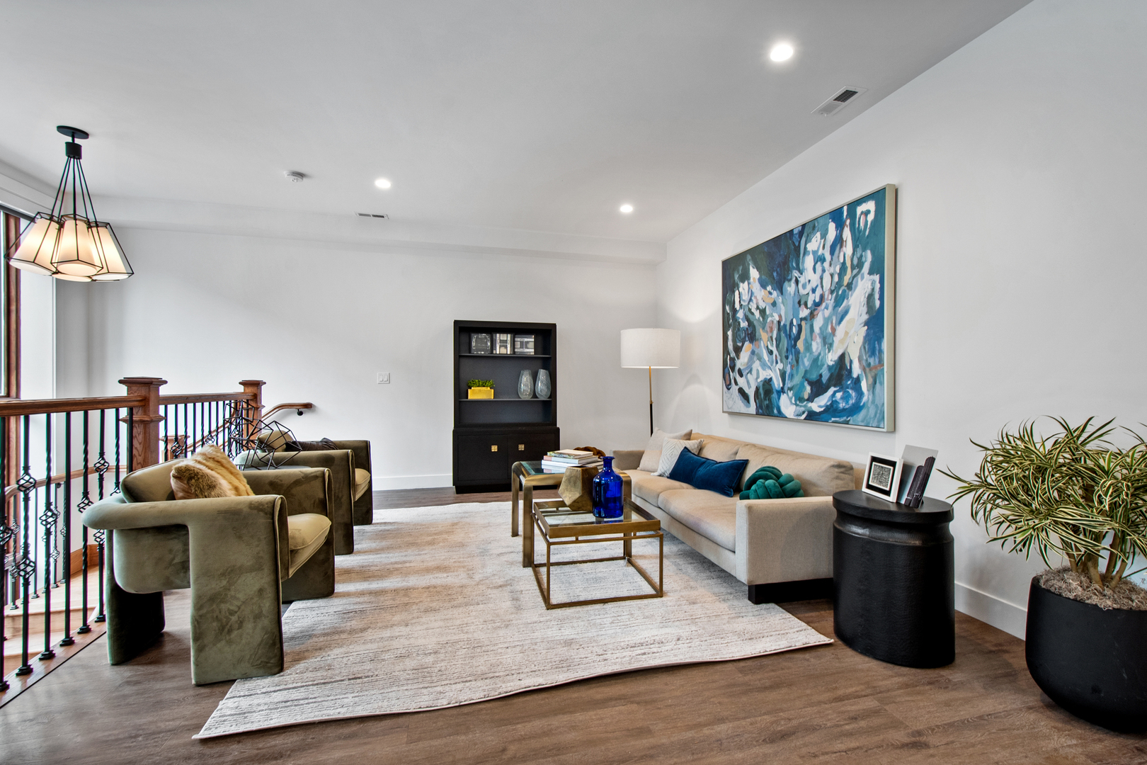 1901 North Halsted Street, Unit 1A Chicago, IL 60614 - Photo 9 of 38 a living room with furniture and a flat screen tv