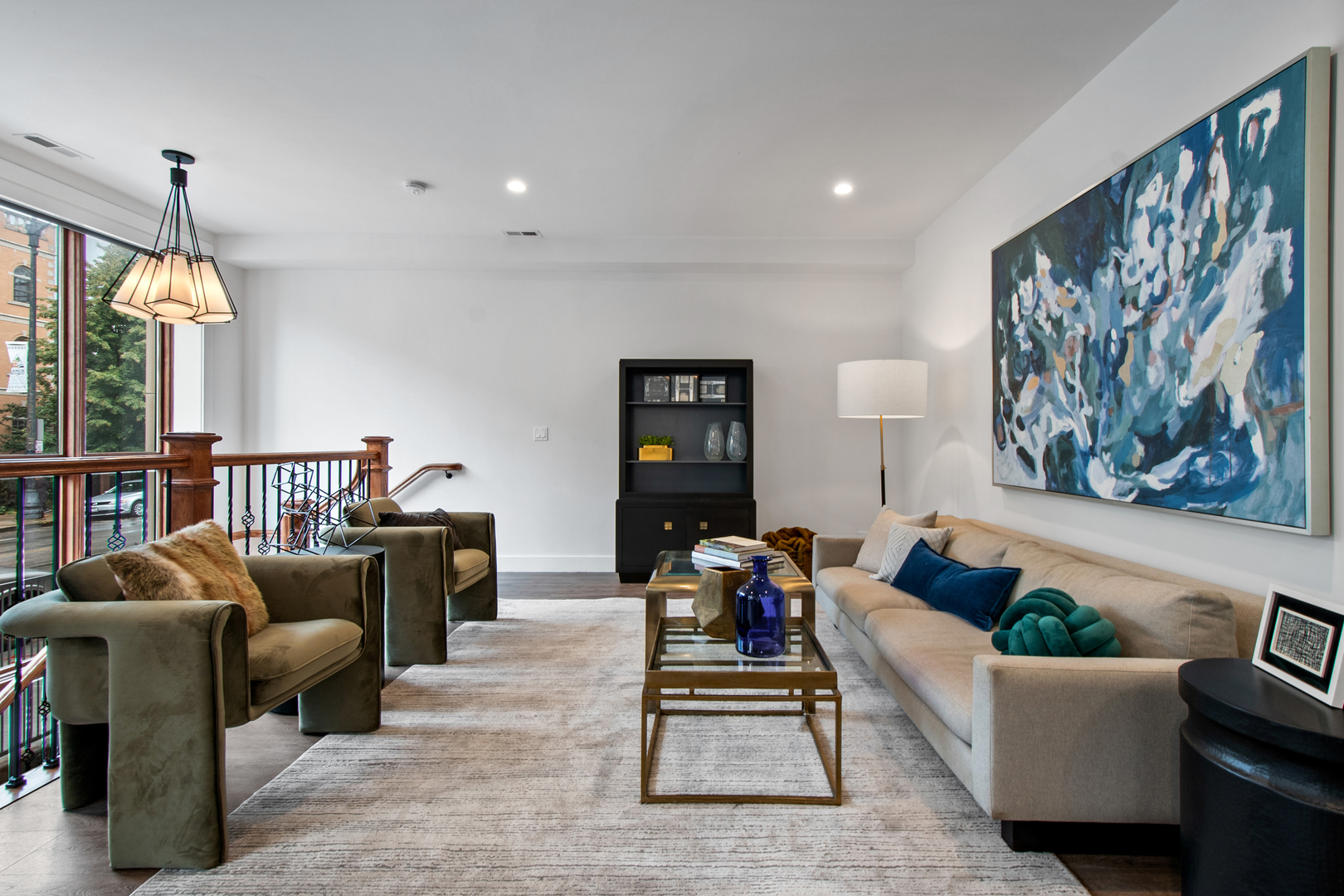 1901 North Halsted Street, Unit 1A Chicago, IL 60614 - Photo 10 of 38 a living room with furniture and a chandelier