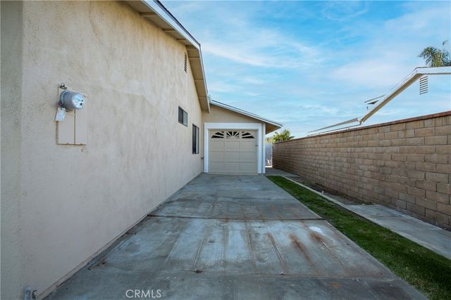 a view of a lake with a house in the background