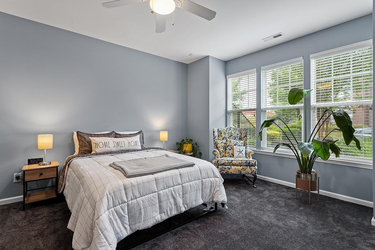 9242 Wooden Road Raleigh, NC 27617 - Photo 28 of 32 First floor bedroom/bonus features boxed bay triple window w/views of the rose bushes in the front courtyard patio. Boxed Bay Window