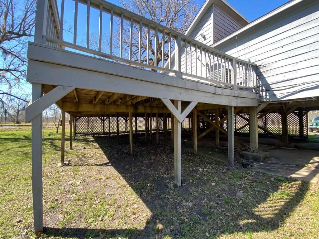 236 Adelaide Drive Cleveland, TX 77327 - Photo 6 of 33 a view of a porch with furniture and a yard