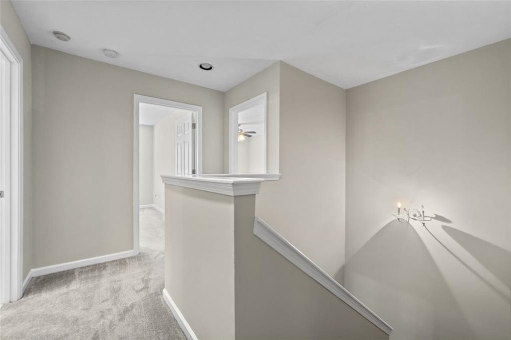 2680 Pine Tree Road Northeast, Unit 5 Atlanta, GA 30324 - Photo 19 of 32 a view of hallway with sink