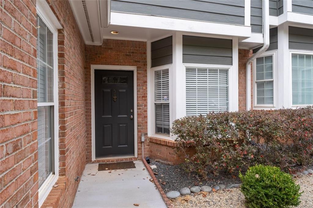 2680 Pine Tree Road Northeast, Unit 5 Atlanta, GA 30324 - Photo 4 of 32 a view of a entrance door of the house