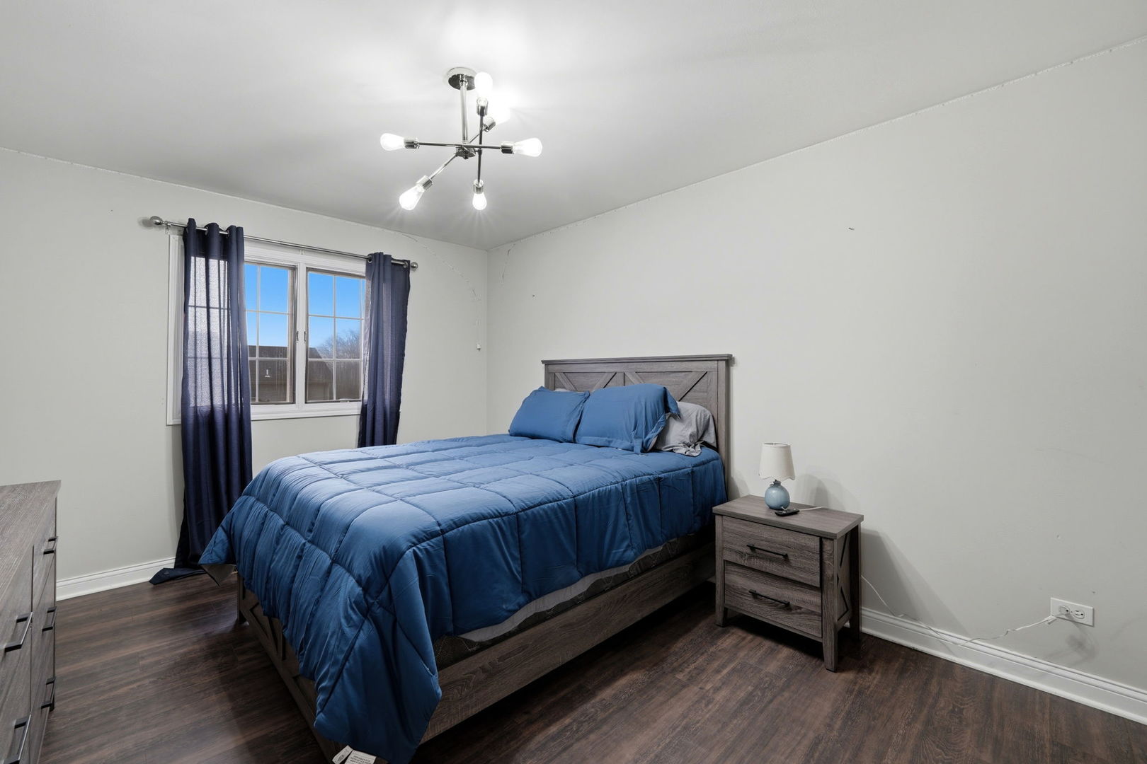 22931 Ridgeway Avenue Richton Park, IL 60471 - Photo 21 of 32 a bedroom with a bed and wooden floor