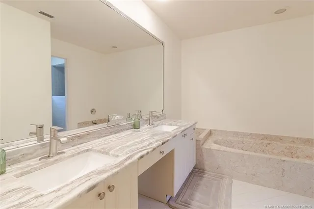 a swimming pool with outdoor seating and yard