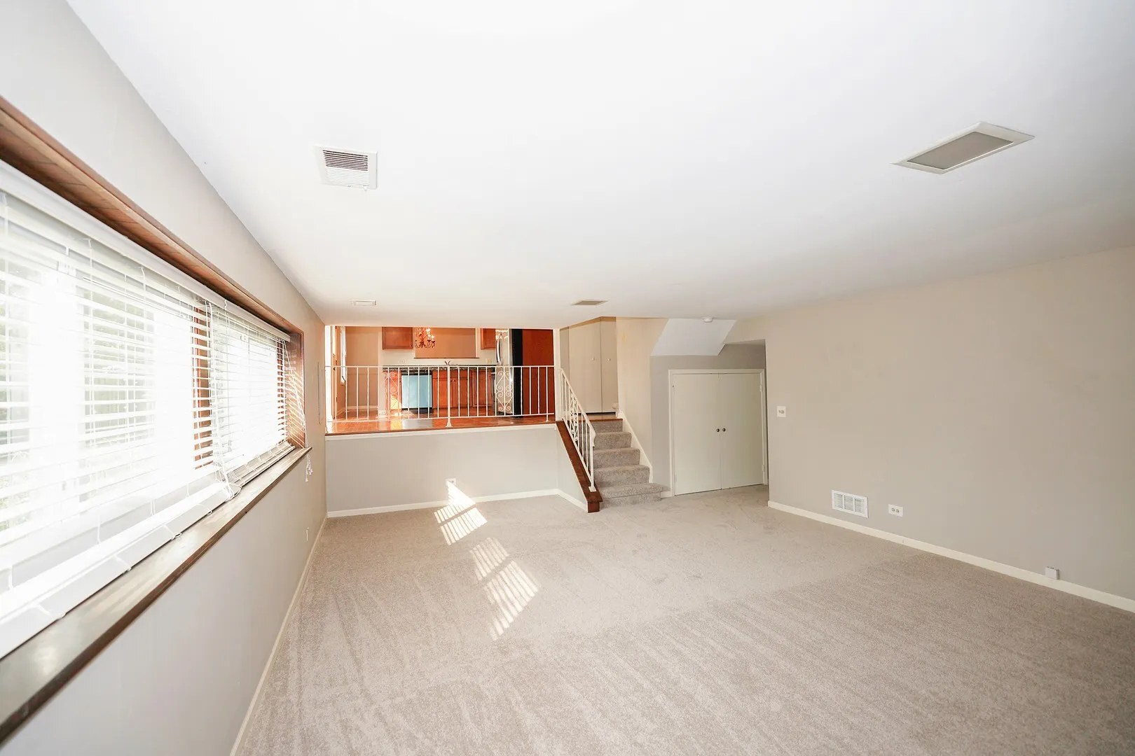 1329 Stonegate Road Naperville, IL 60540 - Photo 13 of 19 a view of an empty room with a window