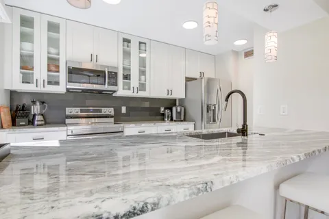 $10,000 | 512 Brackenwood Place, Palm Beach Gardens, FL 33418