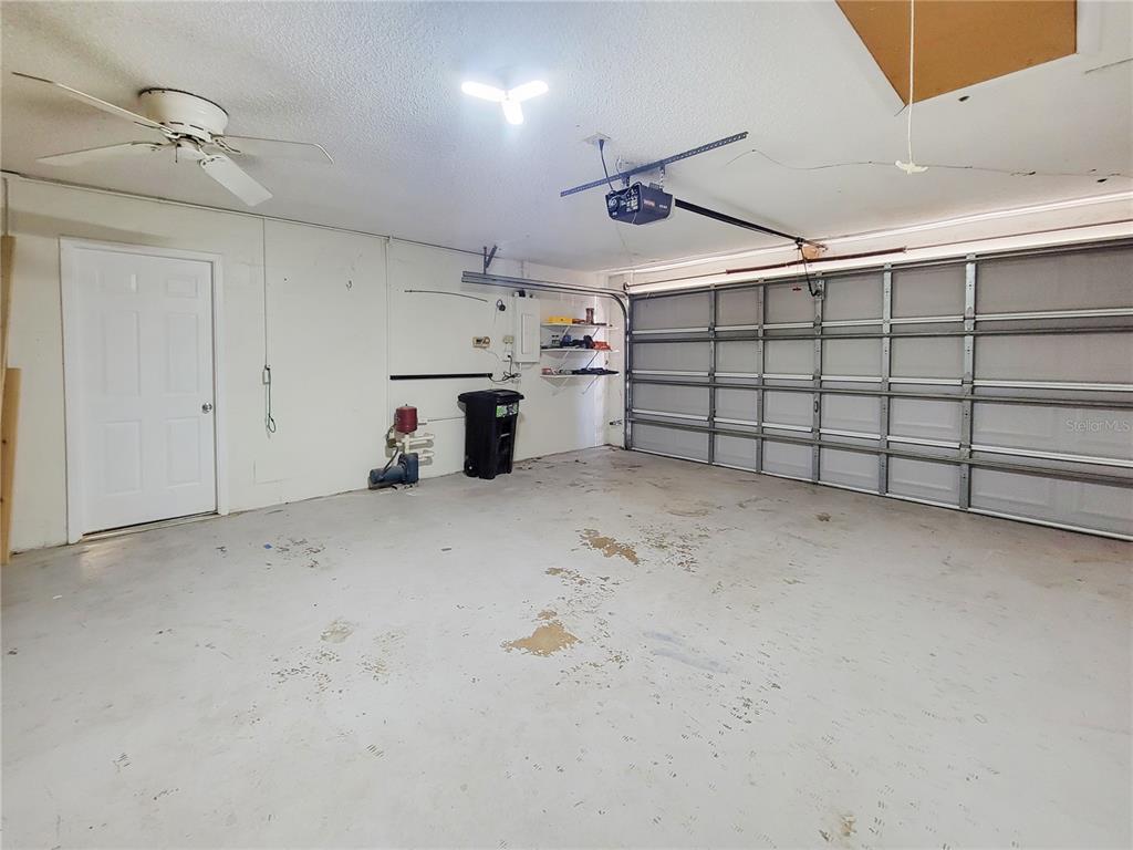 12427 Willow Tree Avenue Hudson, FL 34669 - Photo 24 of 27 a view of a garage