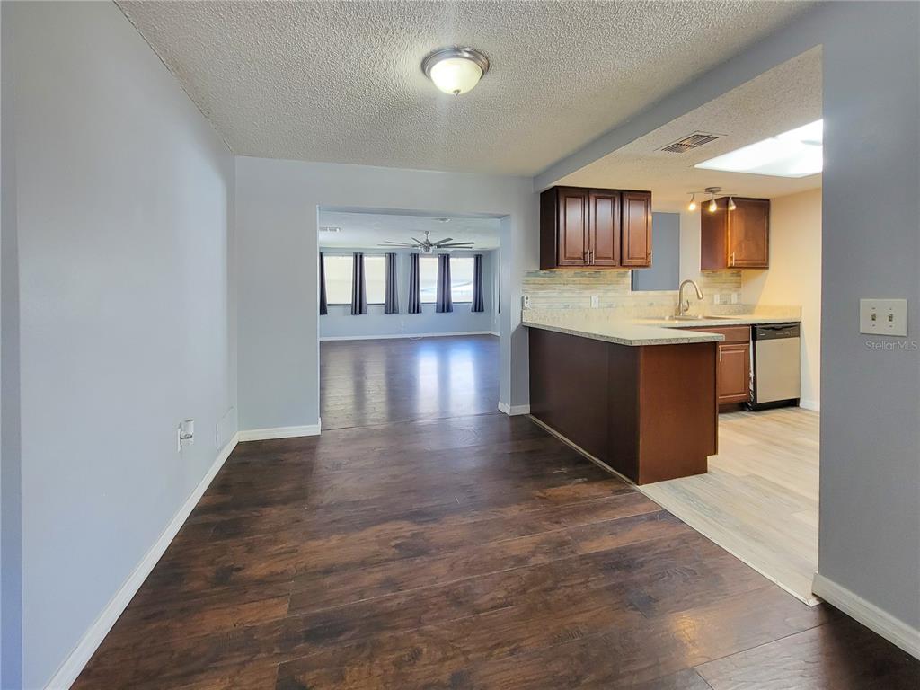 12427 Willow Tree Avenue Hudson, FL 34669 - Photo 8 of 27 a view of kitchen with sink and cabinets