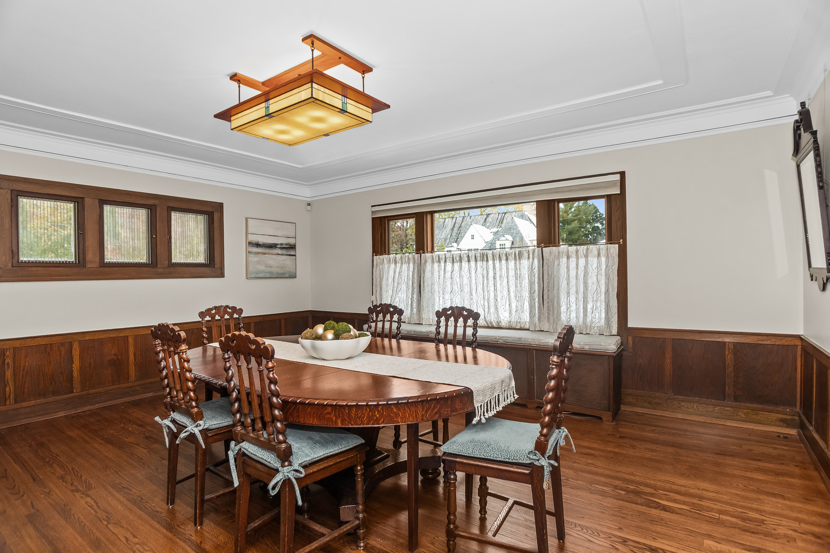 2528 Sheridan Road Evanston, IL 60201 - Photo 14 of 55 a view of a dining room with furniture window and wooden floor