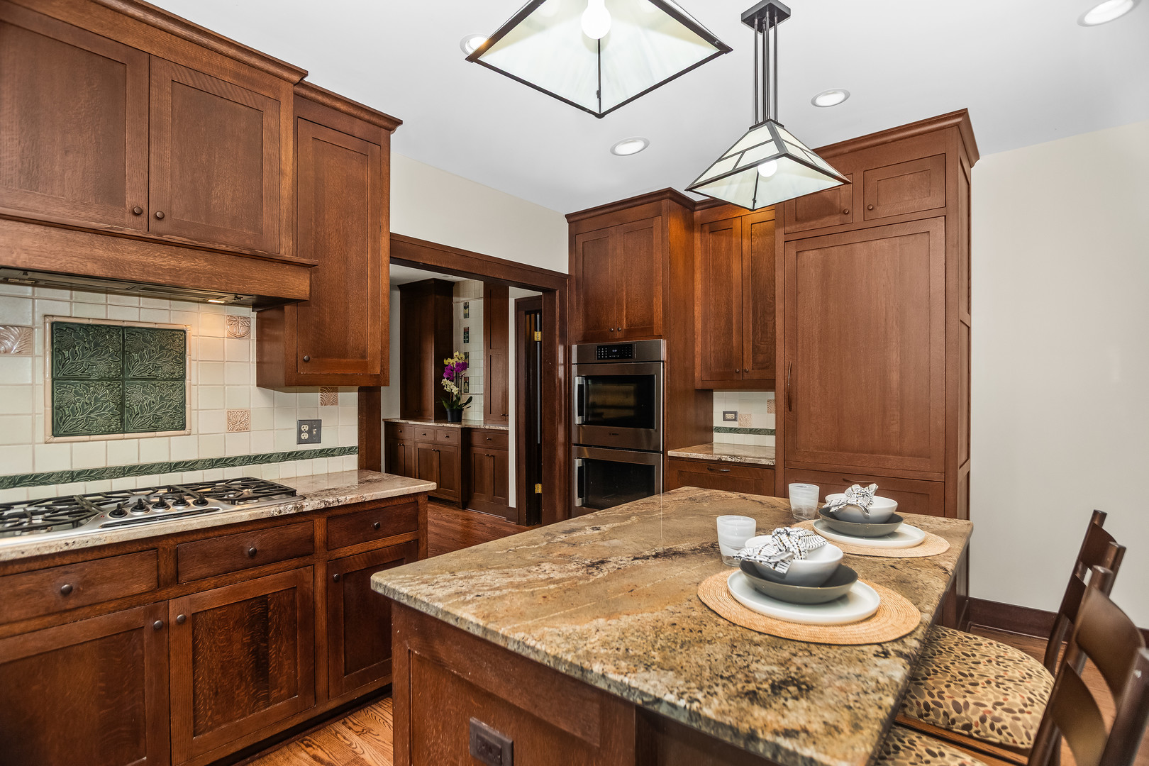 2528 Sheridan Road Evanston, IL 60201 - Photo 16 of 55 a kitchen with stainless steel appliances granite countertop a stove refrigerator and cabinets