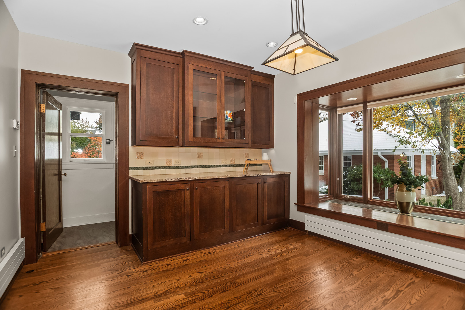2528 Sheridan Road Evanston, IL 60201 - Photo 20 of 55 a view of front door and bedroom with wooden floor