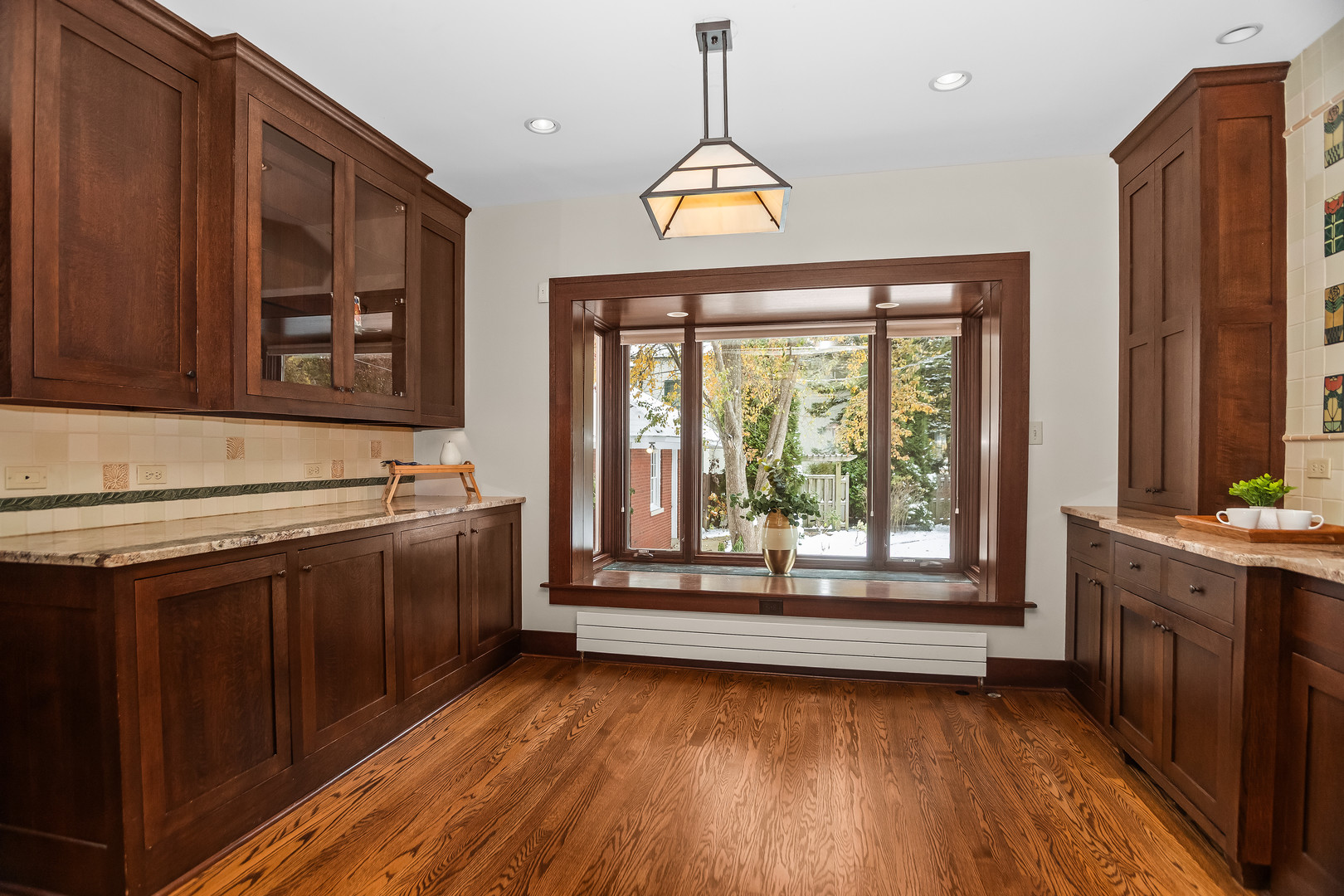 2528 Sheridan Road Evanston, IL 60201 - Photo 22 of 55 a kitchen with stainless steel appliances granite countertop a stove a sink and a refrigerator