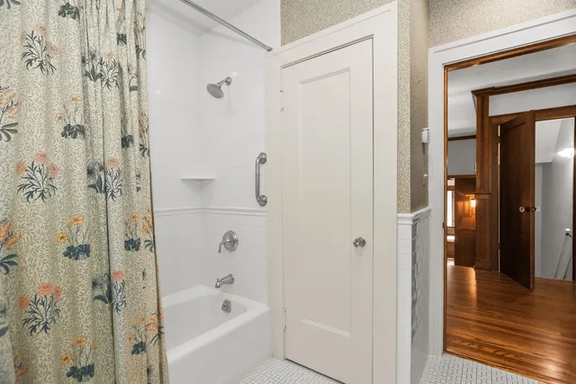 a bathroom with a sink and mirror