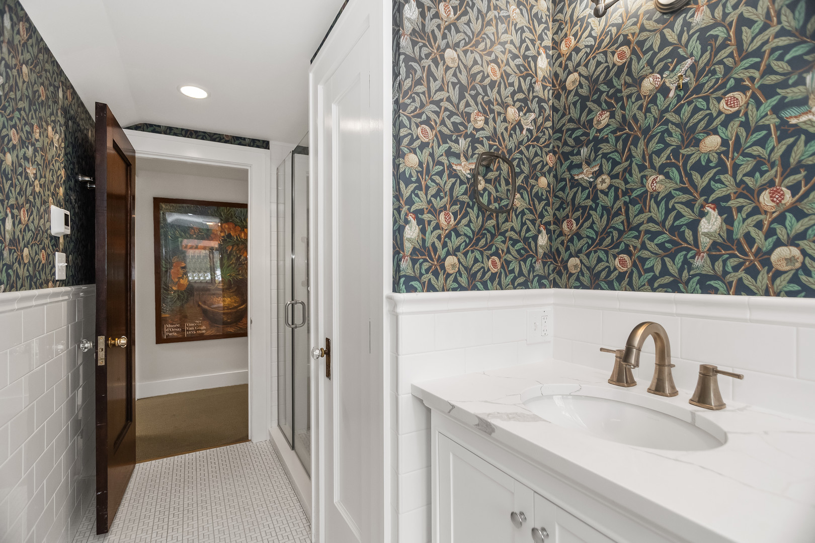 2528 Sheridan Road Evanston, IL 60201 - Photo 51 of 55 a bathroom with a sink and mirror