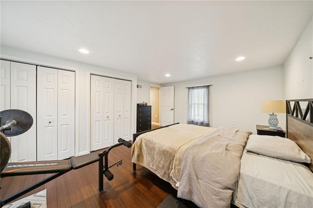 869 Middletown Road New Stanton, PA 15672 - Photo 15 of 30 a bedroom with a bed and cabinets