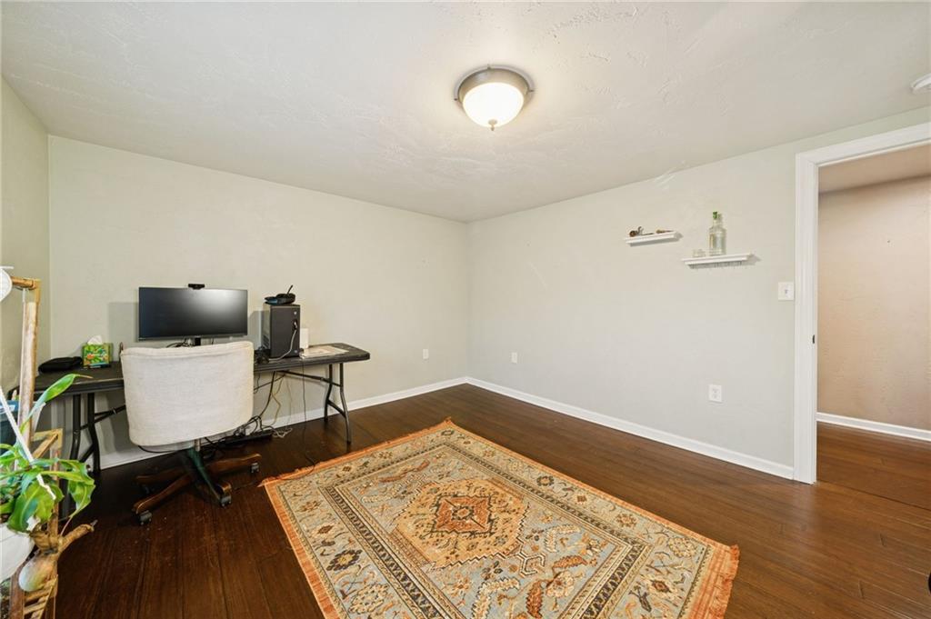 869 Middletown Road New Stanton, PA 15672 - Photo 18 of 30 a workspace with furniture and rug