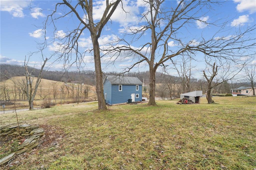 869 Middletown Road New Stanton, PA 15672 - Photo 21 of 30 a view of a yard with a tree