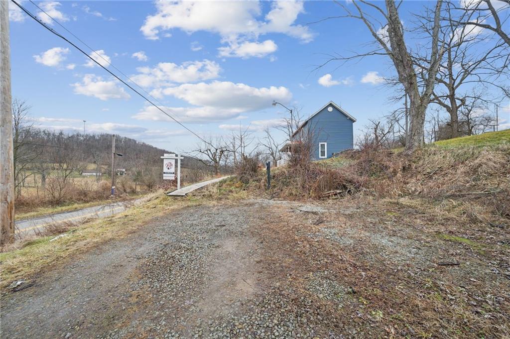 869 Middletown Road New Stanton, PA 15672 - Photo 27 of 30 a view of a yard in front of a house
