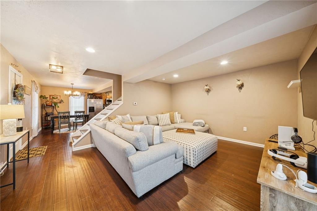869 Middletown Road New Stanton, PA 15672 - Photo 3 of 30 a living room with furniture and a wooden floor