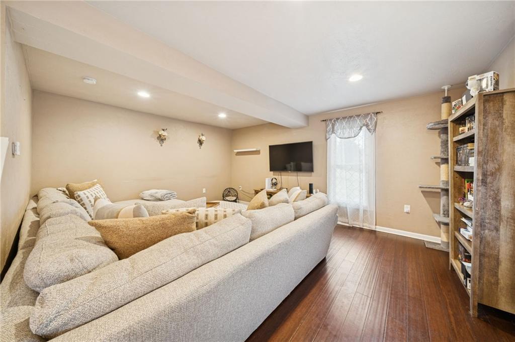 869 Middletown Road New Stanton, PA 15672 - Photo 4 of 30 a living room with furniture and wooden floor