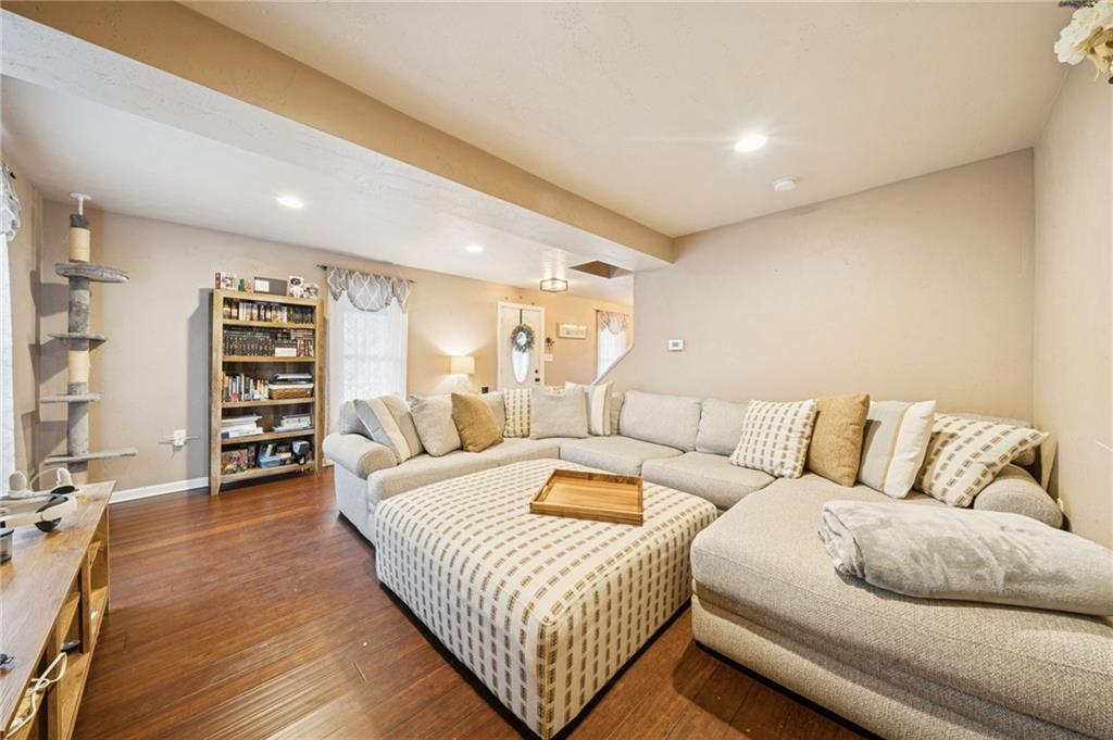 869 Middletown Road New Stanton, PA 15672 - Photo 5 of 30 a living room with furniture and a wooden floor
