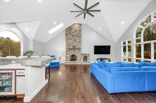 a bed room with bed and a tv