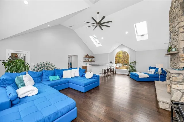 a bathroom with a double vanity sink toilet and shower