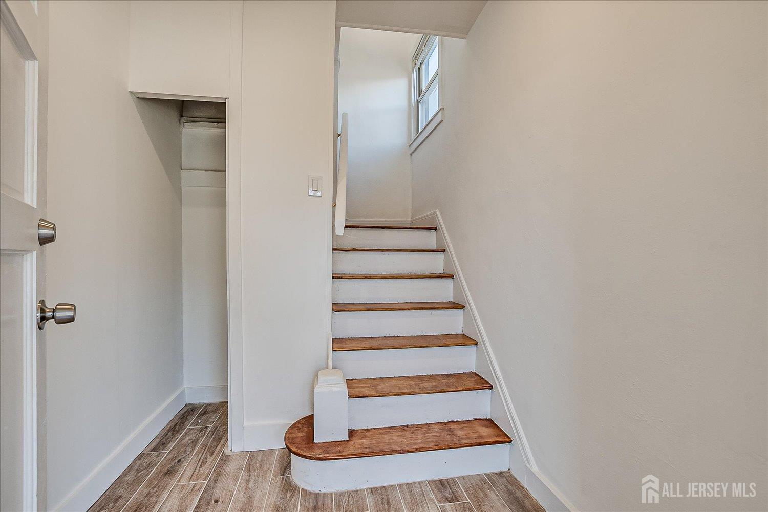 385 Pierson Avenue, Unit 2 Edison, NJ 08837 - Photo 4 of 18 a view of entryway with wooden floor