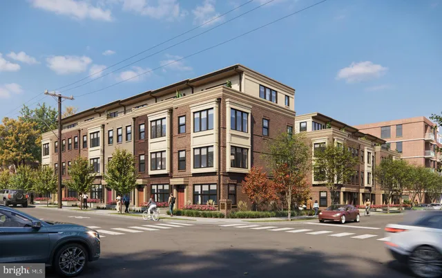 a front view of a building with street view