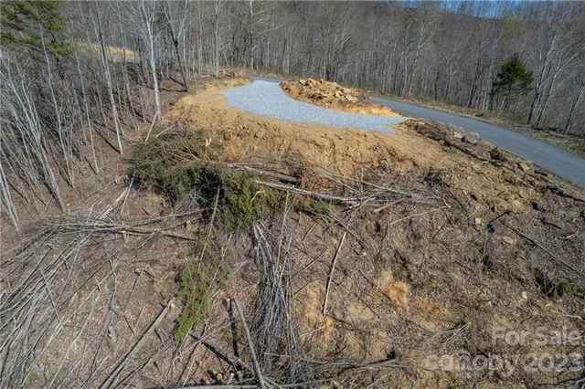 a view of a backyard of the house