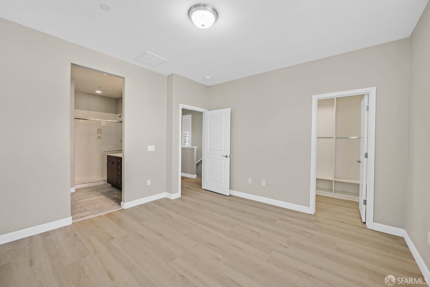 2908 Worthing Common Livermore, CA 94550 - Photo 25 of 33 an empty room with wooden floor & windows