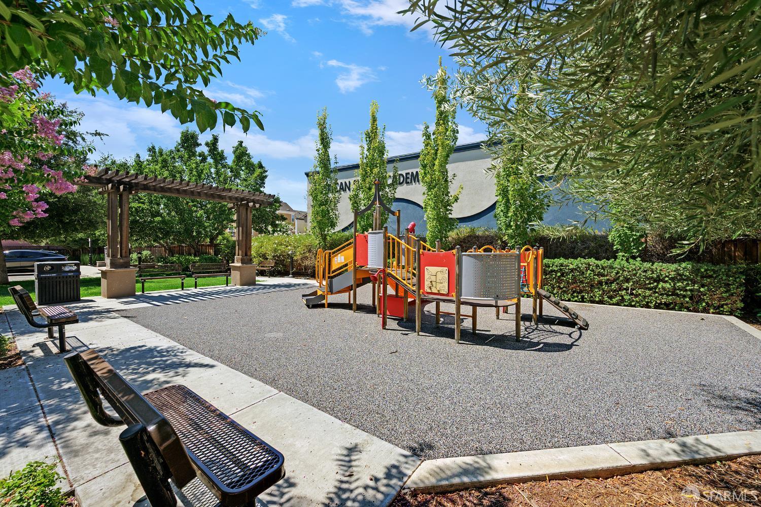 2908 Worthing Common Livermore, CA 94550 - Photo 32 of 33 a childrens park with lots of swings and slides