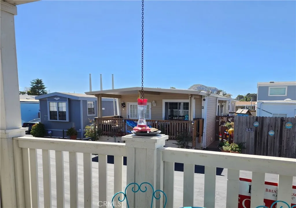 500 Atascadero, Unit E02 Morro Bay, CA 93442 - Photo 16 of 40 a front view of a house having yard