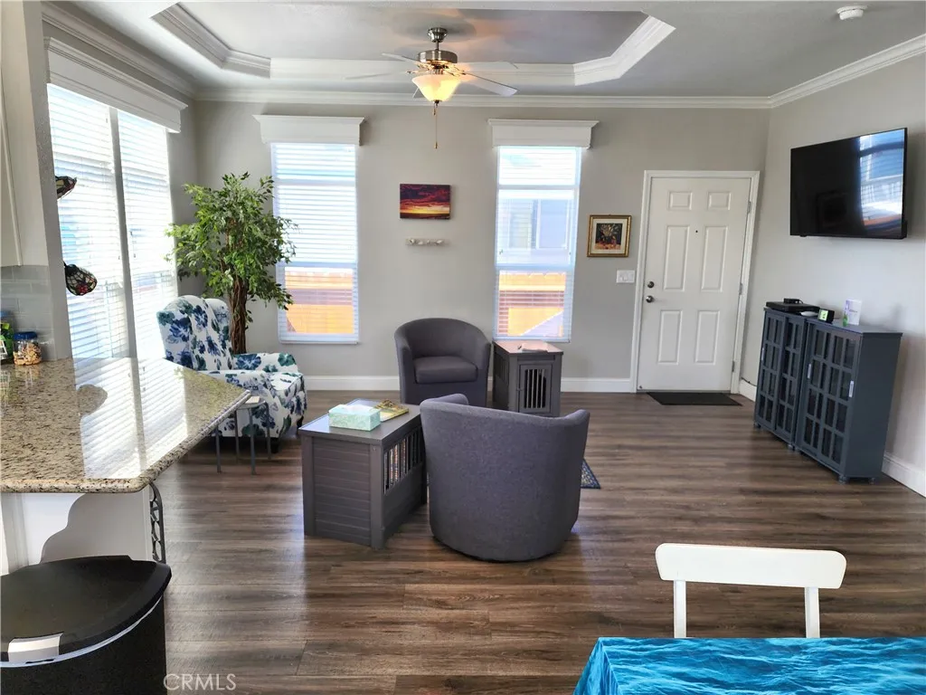 500 Atascadero, Unit E02 Morro Bay, CA 93442 - Photo 21 of 40 a living room with furniture and a flat screen tv