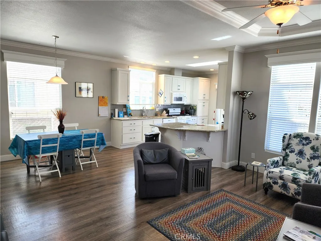 500 Atascadero, Unit E02 Morro Bay, CA 93442 - Photo 22 of 40 a living room with stainless steel appliances furniture and a kitchen view