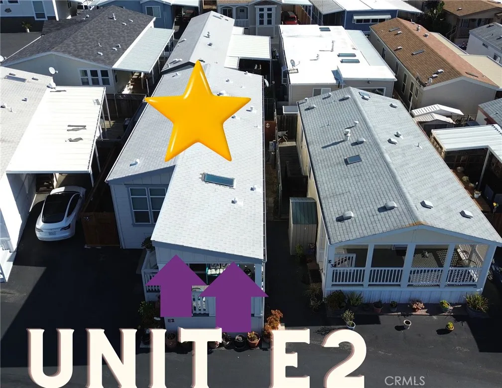 500 Atascadero, Unit E02 Morro Bay, CA 93442 - Photo 4 of 40 an aerial view of a house with a swimming pool