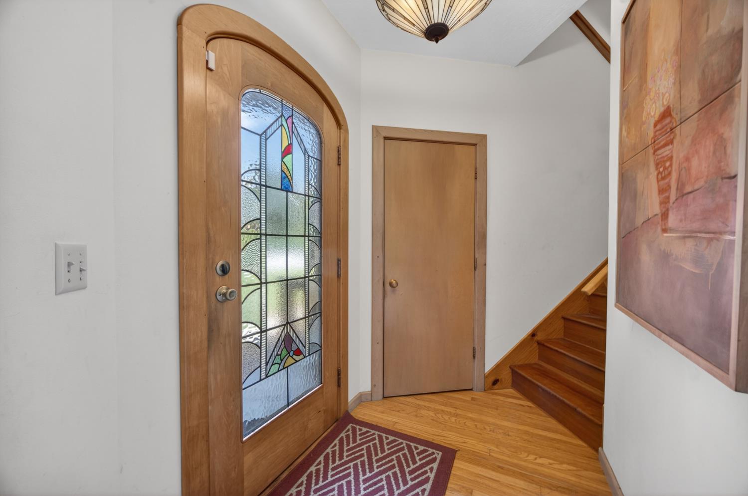 3940 Bannister Road Fair Oaks, CA 95628 - Photo 5 of 84 a view of a hallway with wooden floor and entryway