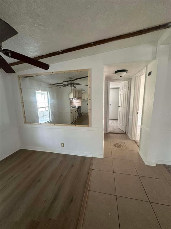 6445 Southeast 173 Lane Summerfield, FL 34491 - Photo 13 of 42 a view of wooden floor and windows in a room