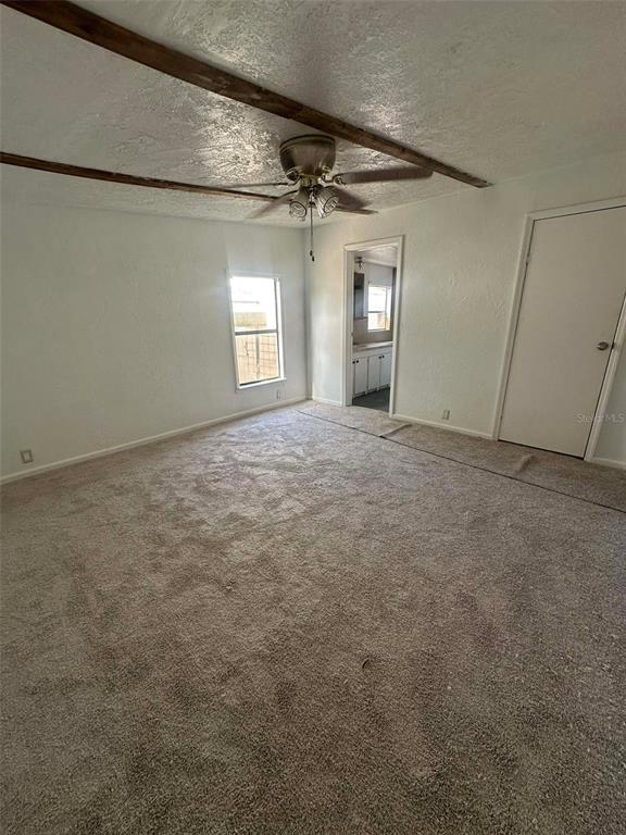 6445 Southeast 173 Lane Summerfield, FL 34491 - Photo 24 of 42 an empty room with a empty space and windows