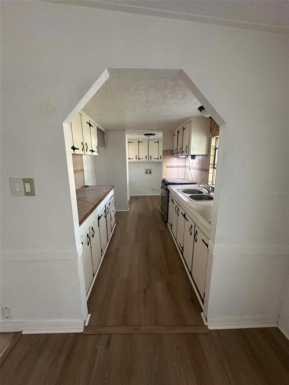 6445 Southeast 173 Lane Summerfield, FL 34491 - Photo 32 of 42 a view of a kitchen from hallway