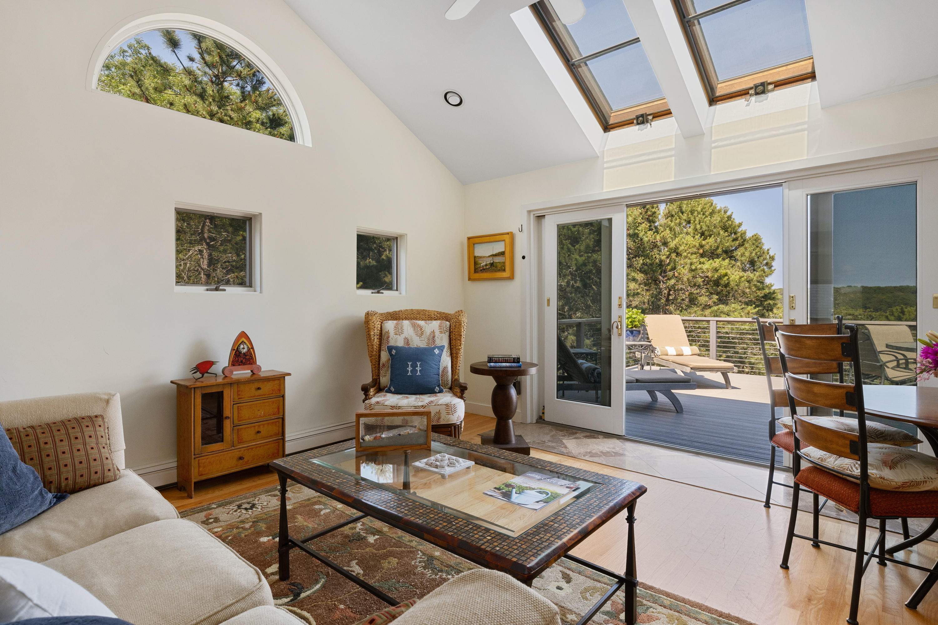 265 King Phillip Road Wellfleet, MA 02667 - Photo 21 of 85 a living room with furniture and a large window