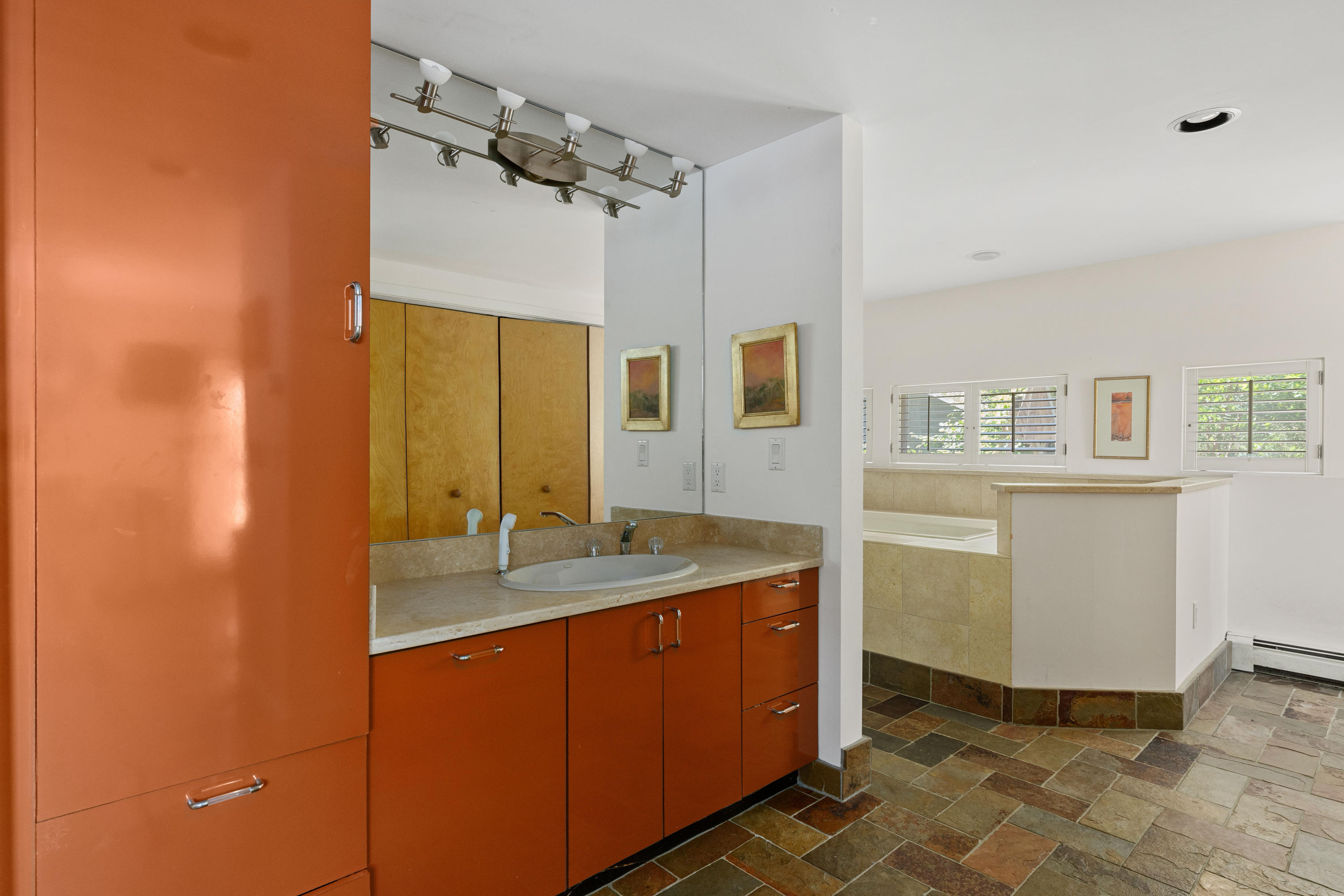 265 King Phillip Road Wellfleet, MA 02667 - Photo 28 of 85 a bathroom with a granite countertop sink a mirror and a shower