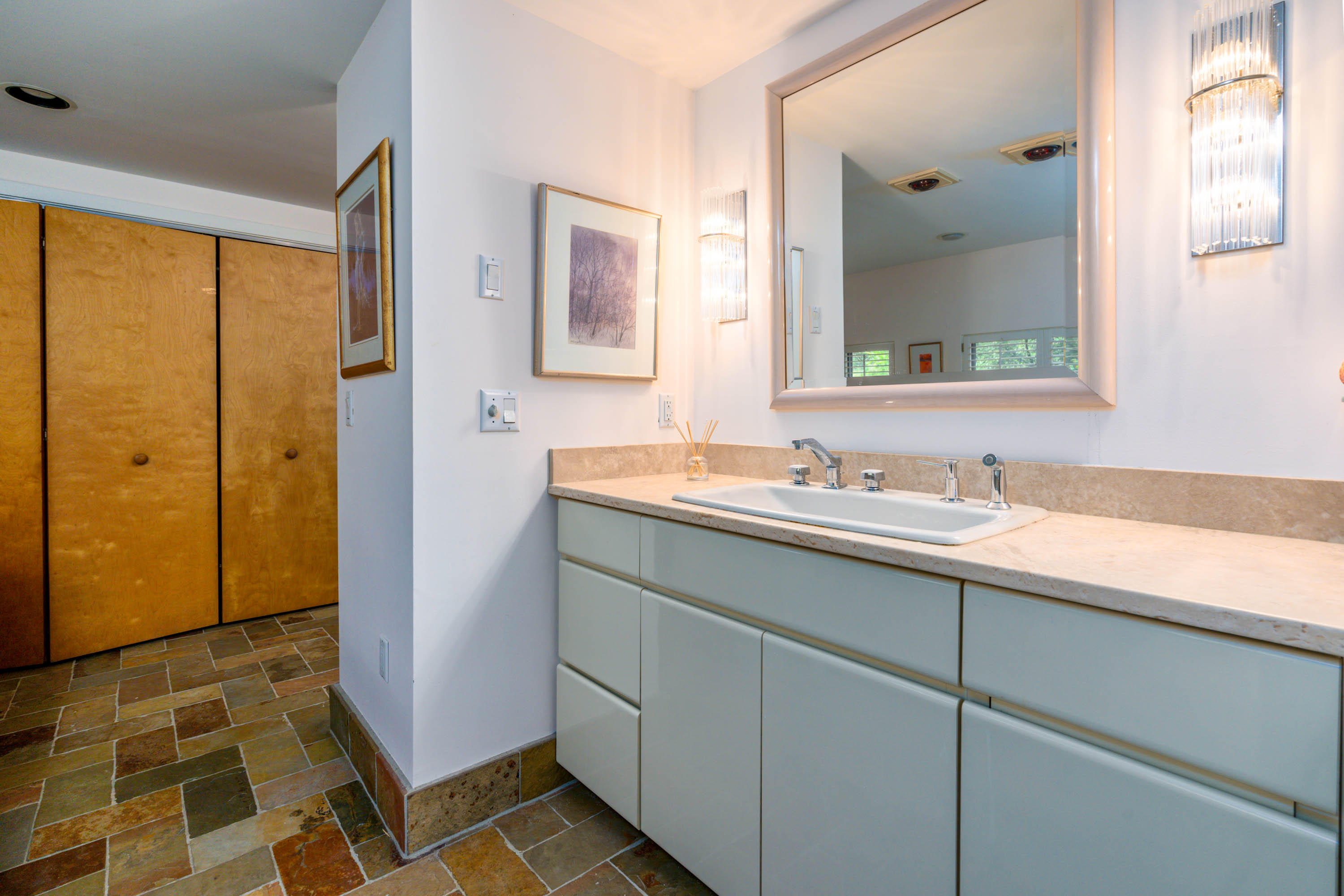 265 King Phillip Road Wellfleet, MA 02667 - Photo 29 of 85 a bathroom with a sink and a mirror