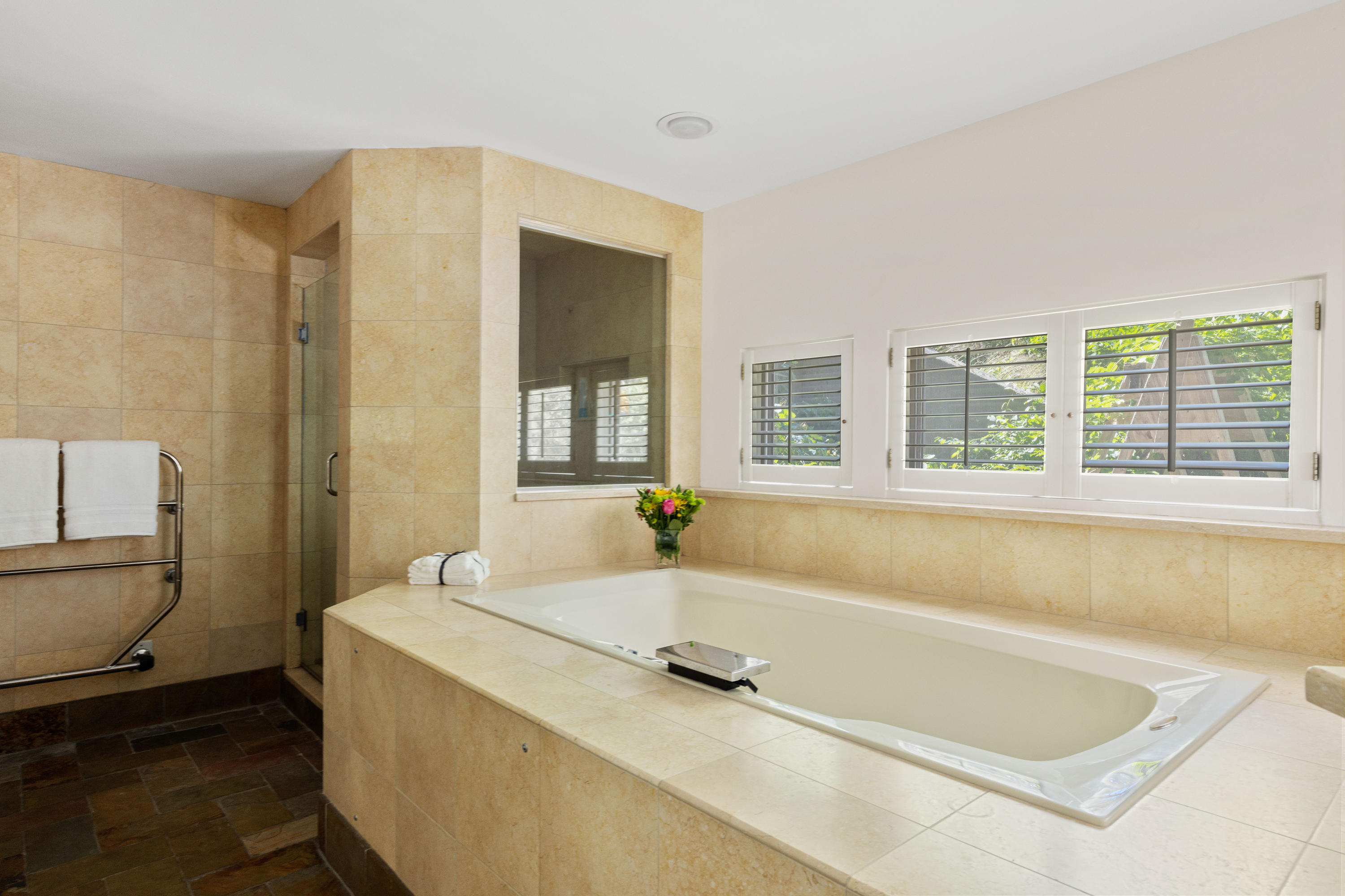 265 King Phillip Road Wellfleet, MA 02667 - Photo 30 of 85 a bathroom with a tub a sink and a window