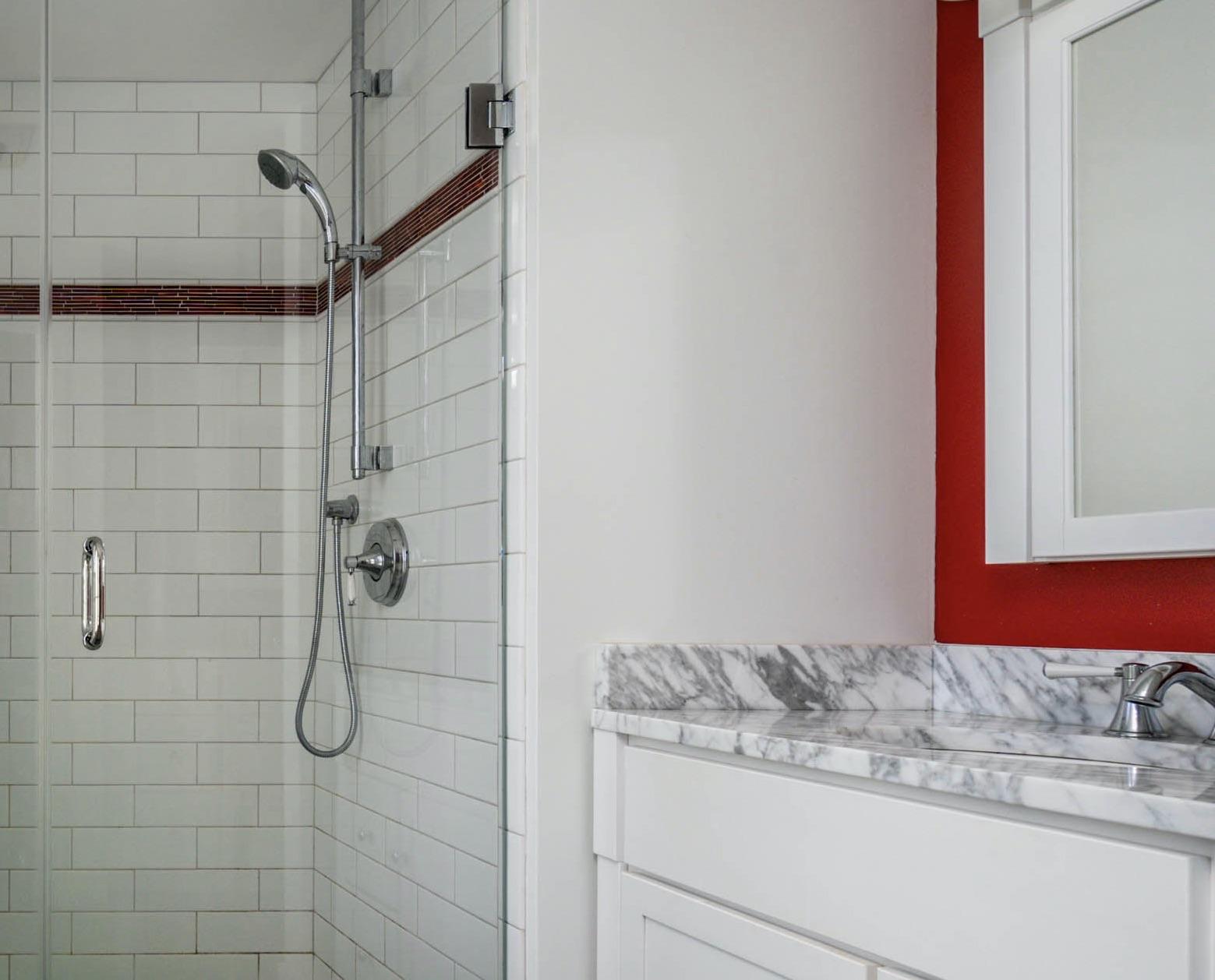 265 King Phillip Road Wellfleet, MA 02667 - Photo 48 of 85 a bathroom with a granite countertop shower and a sink