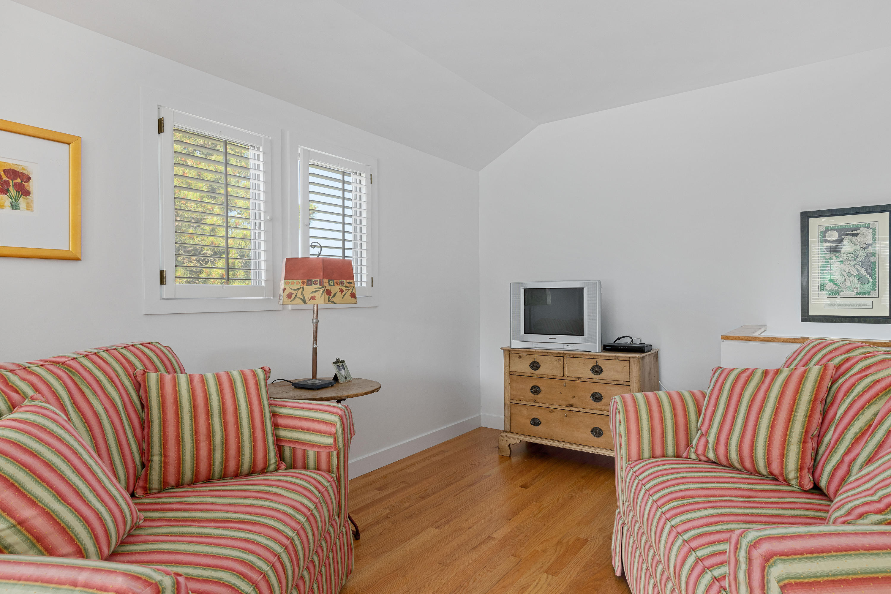 265 King Phillip Road Wellfleet, MA 02667 - Photo 56 of 85 a bedroom with a bed and wooden floor