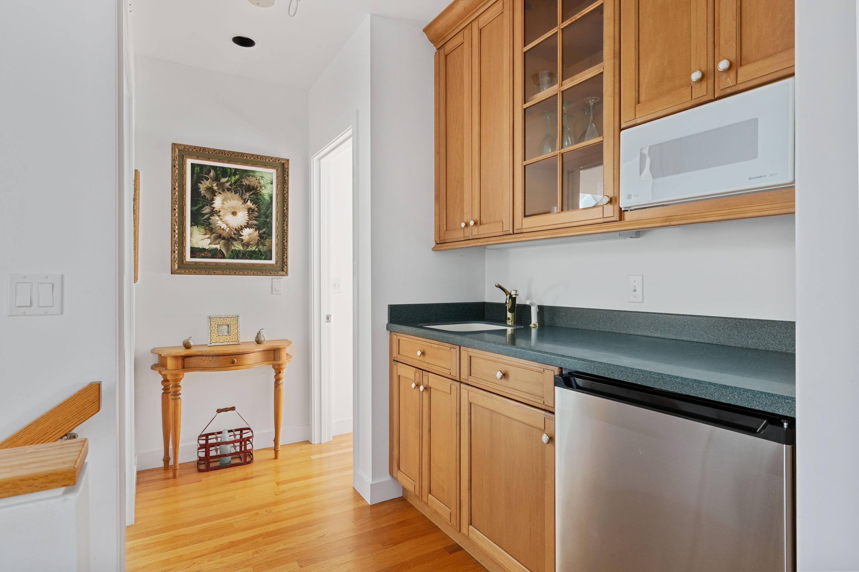 265 King Phillip Road Wellfleet, MA 02667 - Photo 57 of 85 workspace with wooden floor and cabinets