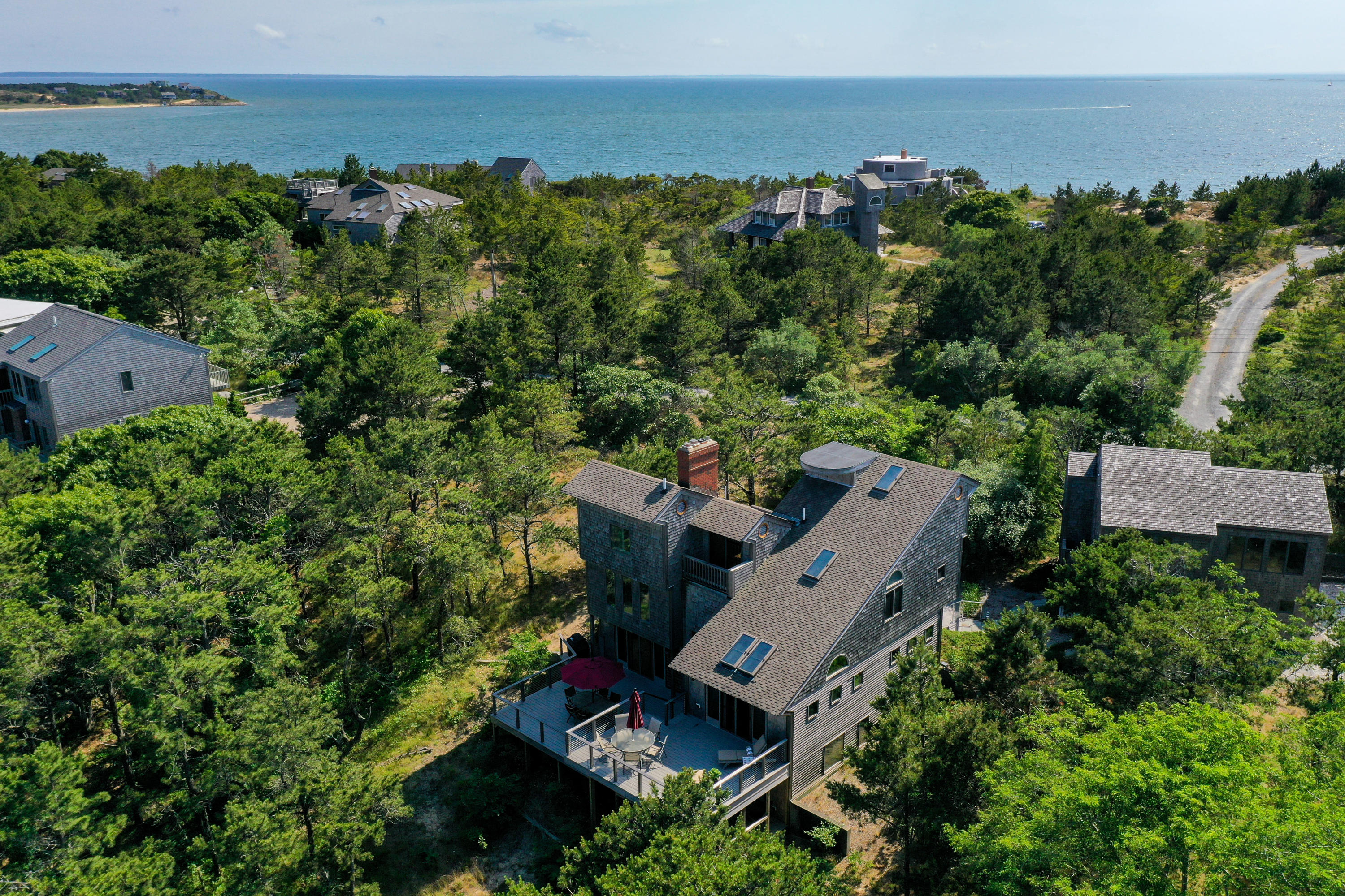 265 King Phillip Road Wellfleet, MA 02667 - Photo 70 of 85 an aerial view of a house with mountain view