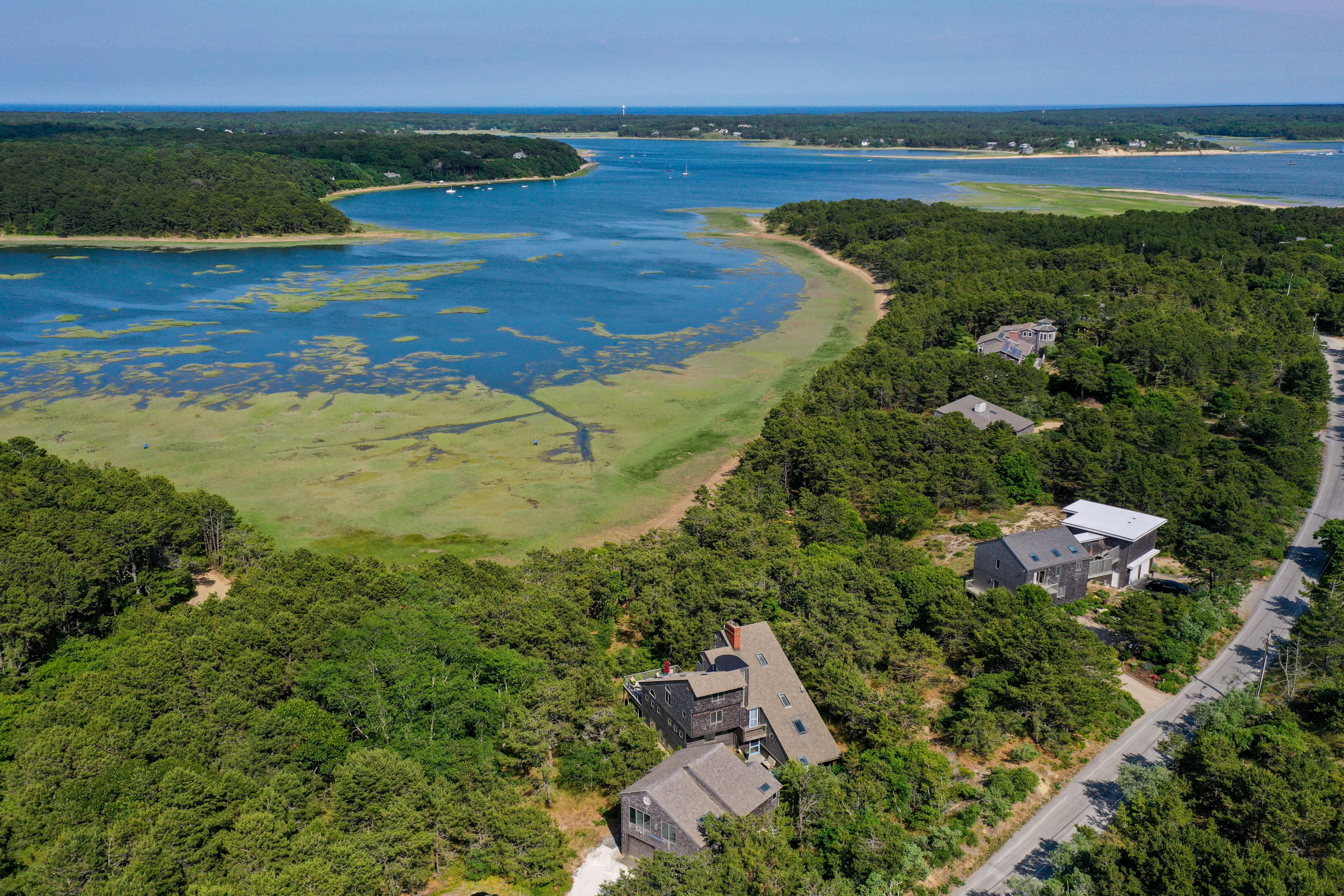 265 King Phillip Road Wellfleet, MA 02667 - Photo 74 of 85 an aerial view of residential houses with outdoor space and trees